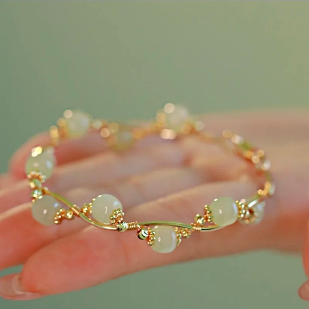 Wire Wrapped Gold Tone Bangle Bracelet with Pale Green Jade-Style Beads – Sculptural Open Design