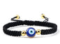 Handwoven Evil Eye Adjustable Bracelet – Gold Bead Accents