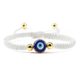 Handwoven Evil Eye Adjustable Bracelet – Gold Bead Accents