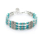 Three-Row Turquoise Alloy Bracelet with Feather Pendant