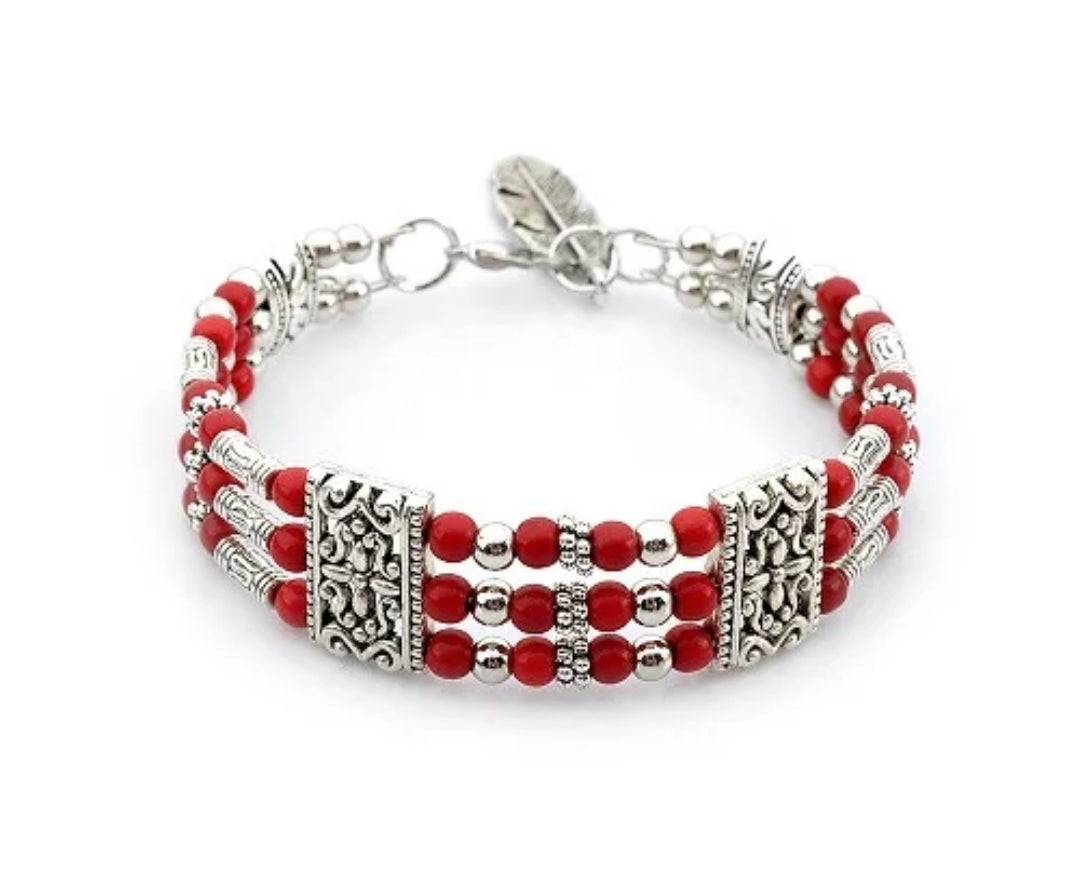 Three-Row Turquoise Alloy Bracelet with Feather Pendant