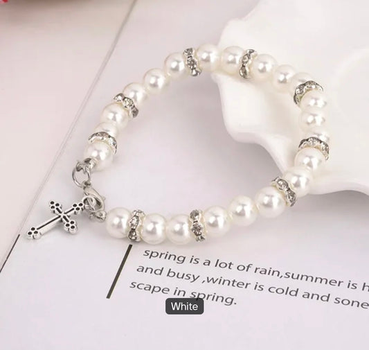 Faux Pearl Charm Bracelet with Rhinestone Spacers & Silver Plated Cross Pendant – Elastic, Available in White, Pink & Black