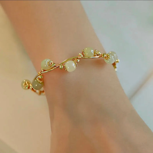 Wire Wrapped Gold Tone Bangle Bracelet with Pale Green Jade-Style Beads – Sculptural Open Design